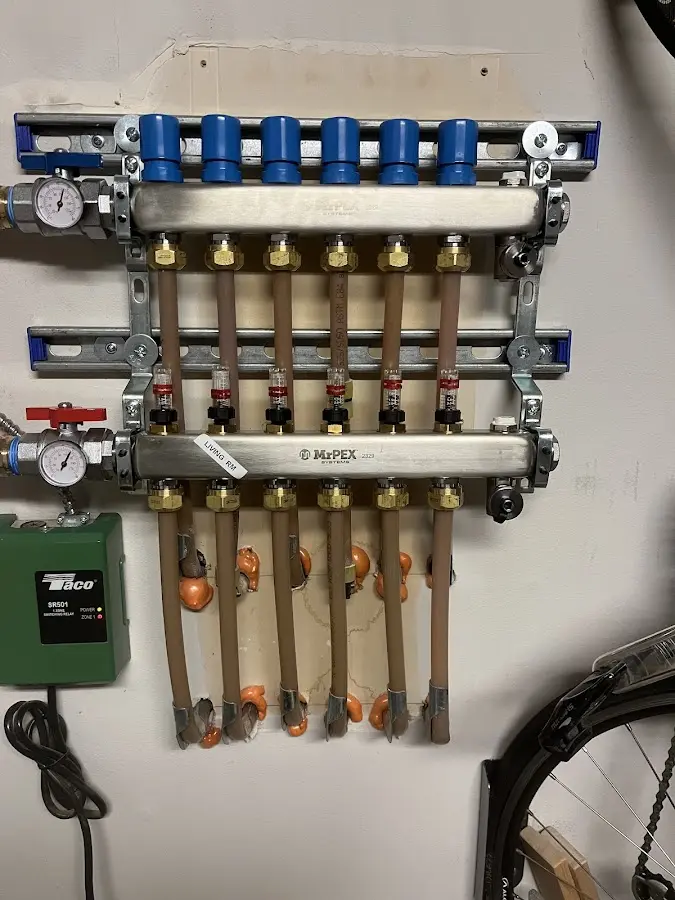 Plumber performing Water Heater Repair at a residential property in Lynden